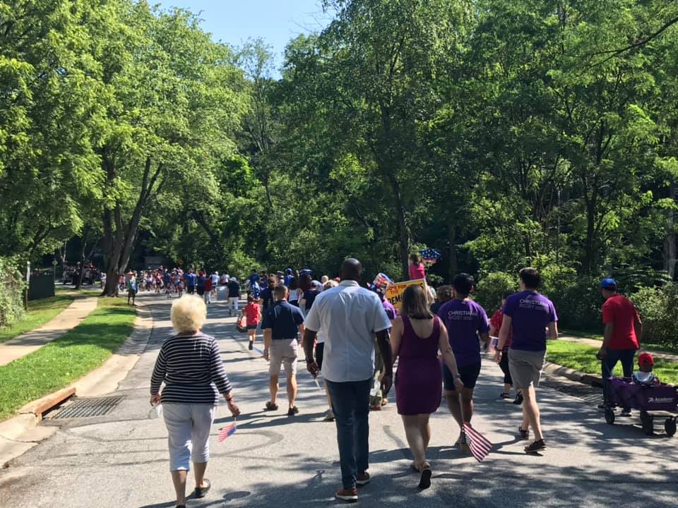 Picture of Columbia Democratic club marching in parade, part of meetings and events